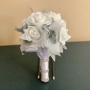 Silver poinsettia and rose wedding bouquet